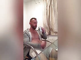 Enjoying a beer and jerking my dick