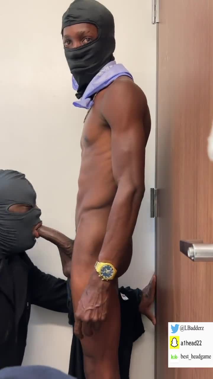 Masked guy blowing a straight young black guy