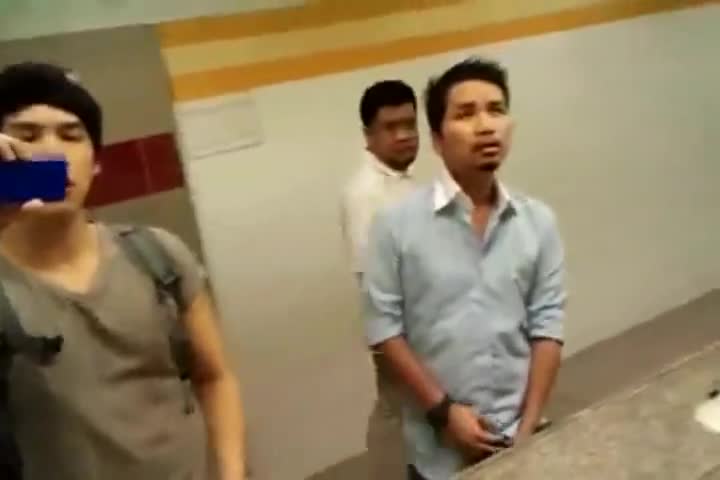 Group of guys rubbing their cock in a public bathroom