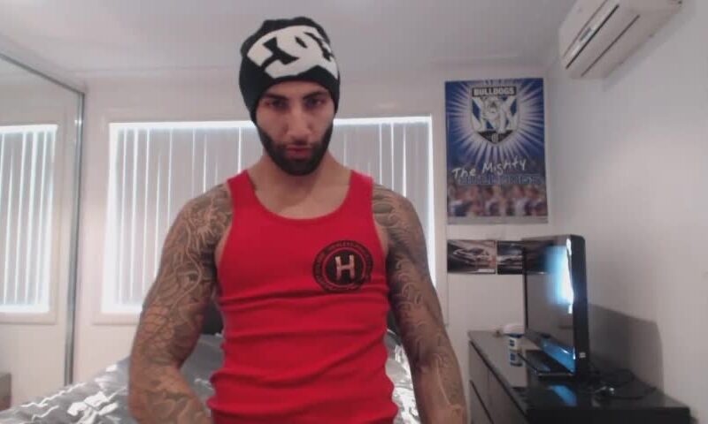 Tattooed stud kerks off and cums hard on cam
